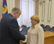 За вклад в развитие законодательства