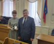 За вклад в развитие законодательства