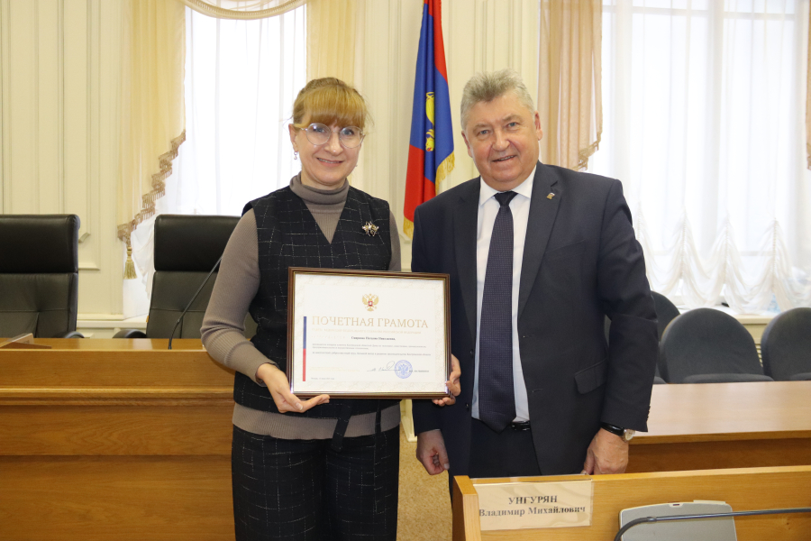 За вклад в развитие законодательства